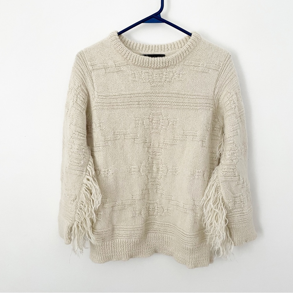 Hand made in Peru 100% baby Alpaca wool sweater with fringed sleeves in ivory